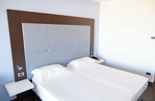 Torre Melissa Hotel | Relax at Hotel Napoleon with Ocean Views and Spa Access