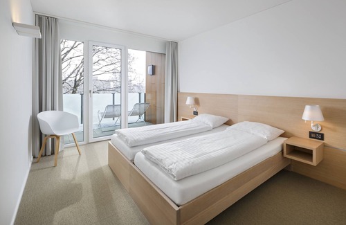 St. Gallen Hotel | Discover Hotel NewStar: Top-Rated Stay with Family Amenities