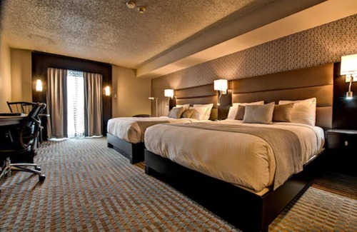 Amos Hotel | Hotel Nouvelle Frontière: Family-Friendly with Breakfast & Hot Tub