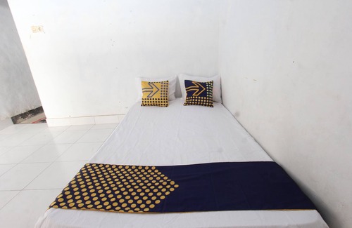 Kecamatan Janapria Hotel | Budget-Friendly Stay at SPOT ON 93441 Gians Homestay