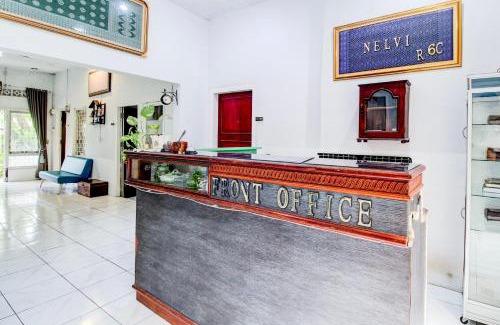 Padang Hotel | Budget-Friendly OYO 433 Nelvi Guest House with Family Perks
