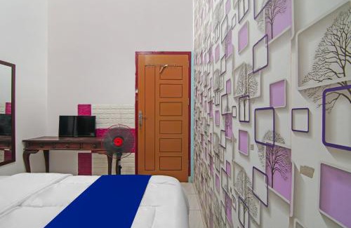 Pekanbaru Hotel | Budget-Friendly Putri Guest House: Perfect for Families