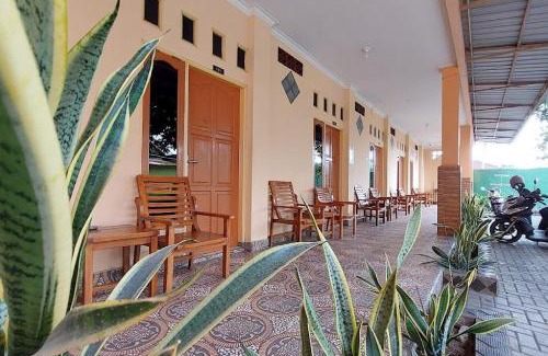 Batu Layar Hotel | Cozy OYO 93757 Rasya Homestay: Pet-Friendly Getaway