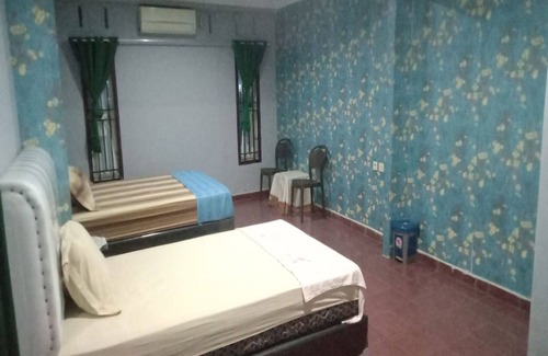 Padang Hotel | Cozy OYO 93292 Raudhatul Husna Homestay with Breakfast