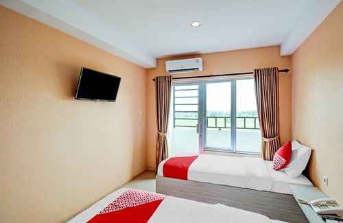 Medan Hotel | Affordable Stay at OYO 90245 Tridasa with Pool & Breakfast