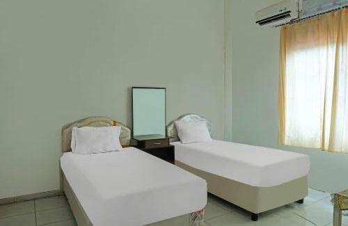 Kalimantan Hotel | Budget-Friendly Stay at SPOT ON 92390 Wilma Kost Syariah