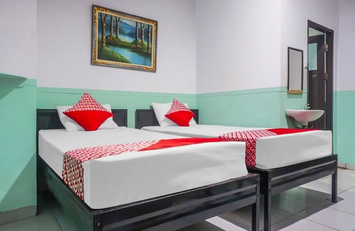 Makassar Hotel | Budget-Friendly OYO 90856 Wisma Favorite in Makassar