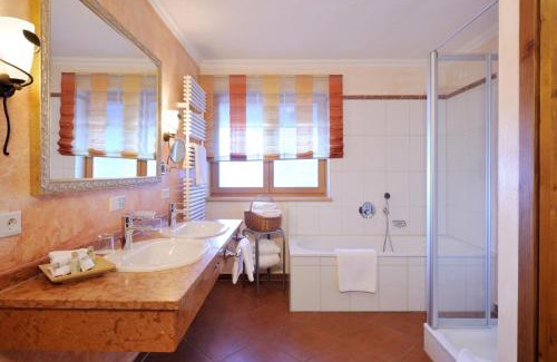 Alpendorf Hotel | Experience Comfort at Hotel Oberforsthof with Ocean Views
