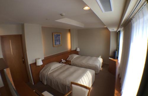 Monbetsu Hotel | Discover Comfort at Hotel Okhotsk Palace with Kitchen & Breakfast