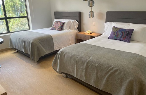 Chico Norte III Hotel | Discover Comfort at Hotel Parque 97 Suites: Rated 8.8/10