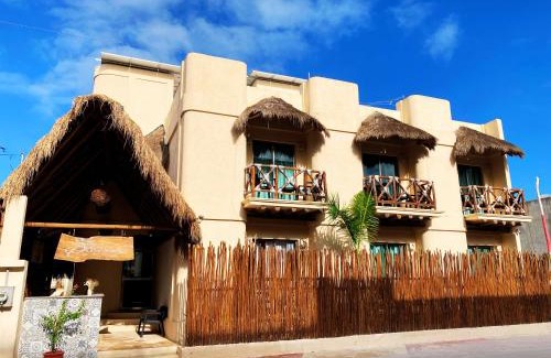 Isla Holbox Hotel | Discover Hotel Pelecanus Suites Holbox with Pool & Dining