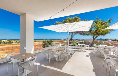 Torre Pali Hotel | Indulge at Perla Saracena Suites - Comfort and Amenities Await
