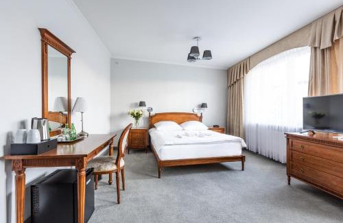 Kielce Hotel | Discover Hotel Pod Złotą Różą: 4-Star Comfort & Amenities