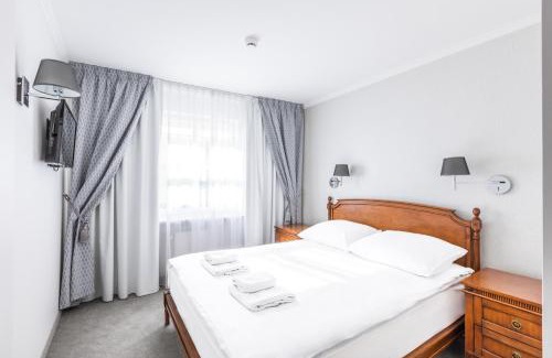 Kielce Hotel | Discover Hotel Pod Złotą Różą: 4-Star Comfort & Amenities