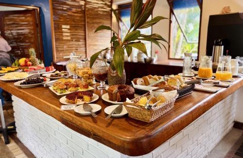 Arraial d'Ajuda Hotel | Relax at Hotel Pousada Pitinga with Oceanfront Bliss