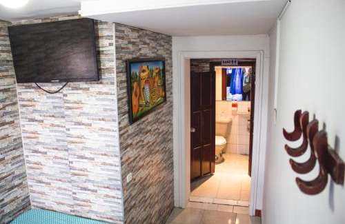 Fontibon Hotel | Budget-Friendly Hotel Punto 100 with Breakfast & Family Perks