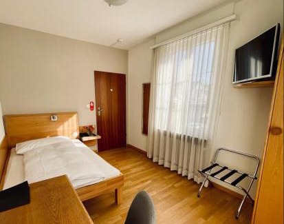Allschwil Hotel | Discover Hotel Rössli: Pet-Friendly Retreat with Dining