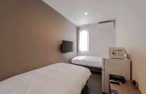 Ami Hotel | Eco-Friendly Retreat at HOTEL R9 The Yard Ami - Rated 8.4