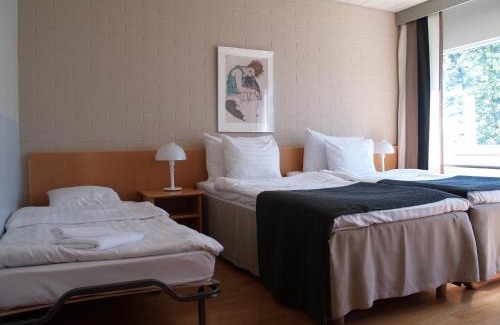 Itainen District Hotel | Relax at Hotel Rantapuisto: Oceanfront Retreat & Amenities