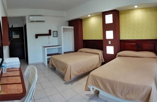 Tecolutla Municipality Hotel | Discover Hotel Real del Quijote: Family-Friendly Retreat