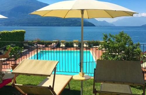 Gravedona Hotel | Discover Hotel Regina: Oceanfront Stay with Private Beach
