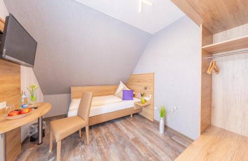 Wolfschlugen Hotel | Cozy Hotel Reinhardtshof Garni: Child Friendly & Breakfast Included