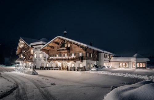 Koessen Hotel | Hotel Riedl: 4-Star Oceanfront Retreat with Spa & Pool