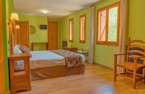 Panticosa Hotel | Discover Hotel Sabocos: Comfortable Stay with Pool & Dining