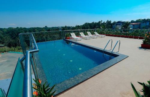 Sulthan Bathery Hotel | Discover Hotel Saffron Wayanad: 4-Star Family Retreat