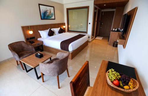 Sulthan Bathery Hotel | Discover Hotel Saffron Wayanad: 4-Star Family Retreat