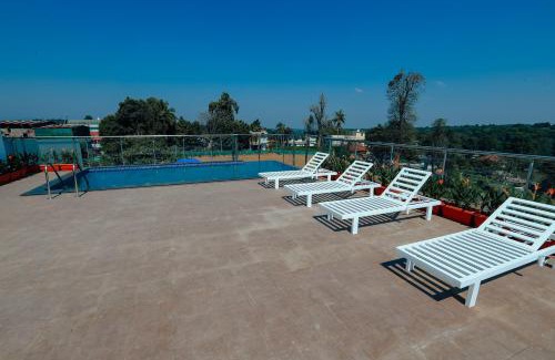 Sulthan Bathery Hotel | Discover Hotel Saffron Wayanad: 4-Star Family Retreat