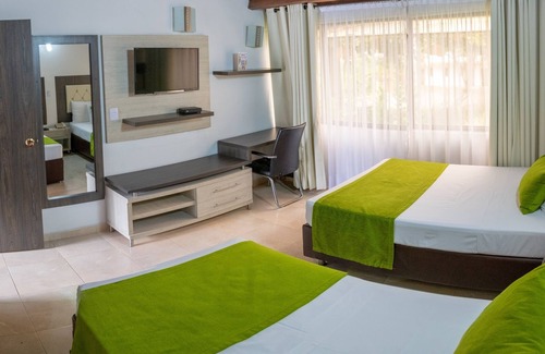 Bucaramanga Hotel | Discover Hotel San Juan Internacional: Pool & Spa Retreat