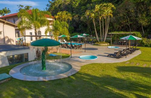Tubarao Hotel | Discover Hotel Sandrini: Oceanfront Escape with Spa & Pool