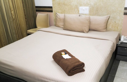 Gandhipuram Hotel | Budget-Friendly Hotel Sapthagiri Nest with Family Amenities