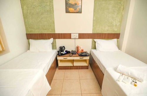 Gandhipuram Hotel | Budget-Friendly Hotel Sapthagiri Nest with Family Amenities