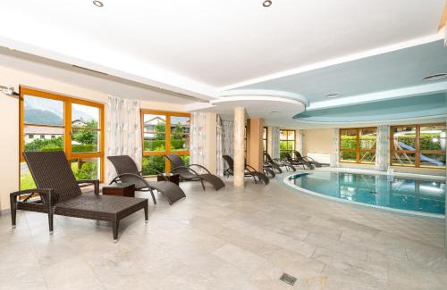 Nauders Hotel | Discover Hotel Schwarzer Adler: Poolside Oceanfront Retreat