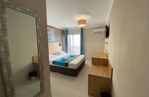 Saint-Denis Hotel | Comfortable Retreat at Hotel Select with Pool and Spa