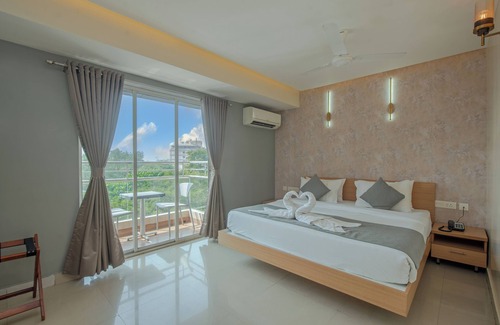 Hampankatta Hotel | Discover Hotel Shoolin Grand: Family-Friendly & Accessible