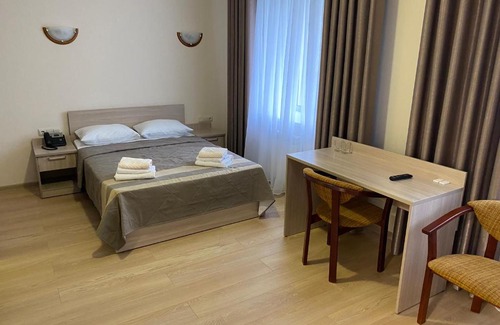 Staryy Oskol Hotel | Discover Hotel Slavyanka: Family-Friendly with Pool & Hot Tub