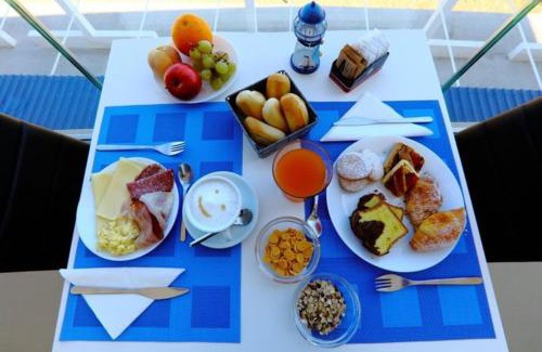 Torre Colonna-sperone Hotel | Relax at Hotel Sporting Club: 4-Star Stay with Ocean Views