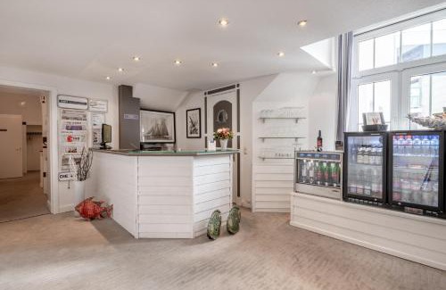 Alt-Travemunde/Ronnau Hotel | Hotel Strandschlösschen: Oceanfront Retreat with Spa Bliss