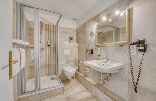 Alt-Travemunde/Ronnau Hotel | Hotel Strandschlösschen: Oceanfront Retreat with Spa Bliss