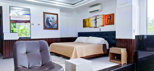 Mocoa Hotel | Discover Hotel Suma Wasi: Family-Friendly with Pool & Hot Tub