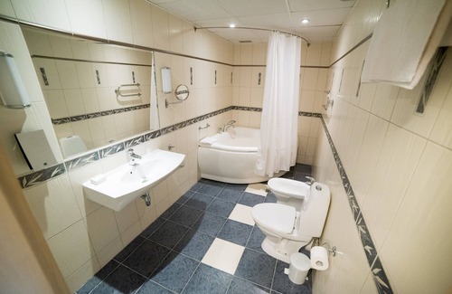 Priekuli Municipality Hotel | Discover Comfort at Hotel Tigra with Pool & Spa Amenities