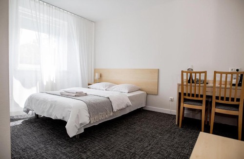 Siauliai Hotel | Discover Hotel Tomas: Pet-Friendly Stay with Great Reviews