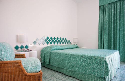 Santa Marina Hotel | Relax at Hotel Torre Oliva with Oceanfront Views & Pool