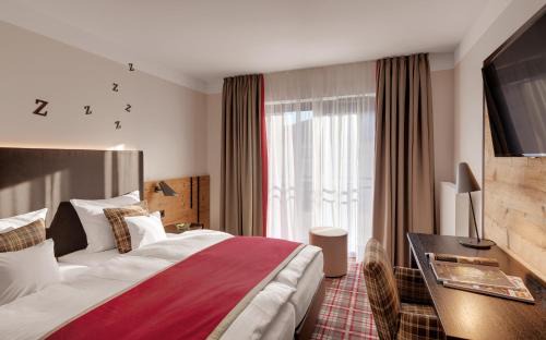 Unterneukirchen Hotel | Discover Hotel Traumschmiede: Rated 9/10 with Hot Tub & Dining