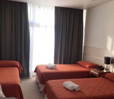 Santa Fe Hotel | Experience Comfort at Hotel UNL-ATE with Pool & Amenities