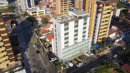 Manaira Hotel | Top-Rated Hotel Village Confort with Inviting Hot Tub
