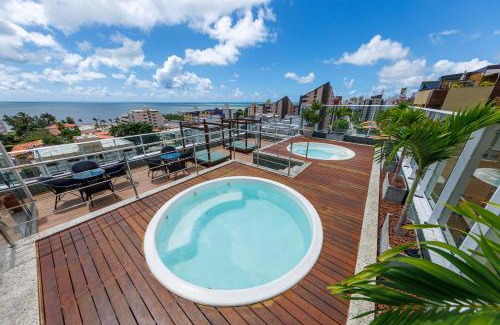 Manaira Hotel | Top-Rated Hotel Village Confort with Inviting Hot Tub